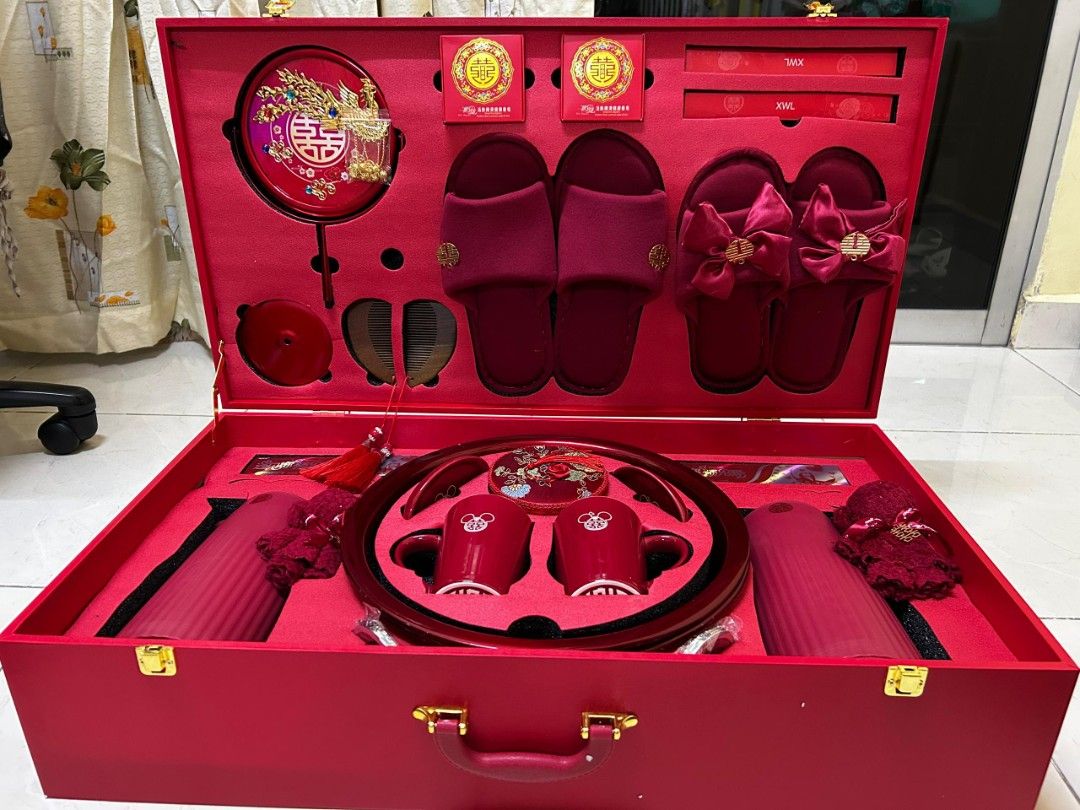 [BNIB] Bride's dowry set (Category: Occasions & Party Supplies) located in Singapore. Submitted by bennie2503 (Listing ID 1438128695, Image 1). Description: [BNIB] Bride's dowry set - All items in a vibrant red color - Perfect for traditional wedding celebrations - Elegant design that can be showcased during your special big day - Comes in a decorative red box.