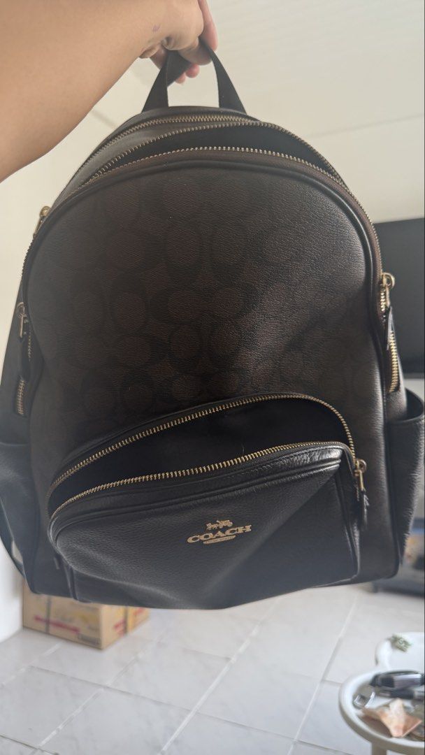 Coach Signature Backpack (Category: Luxury Bags & Wallets) located in Muntinlupa City. Submitted by hiimjea (Listing ID 1438166383, Image 2). Description: - 100% Authentic Pre-loved Coach Backpack - No receipts or paper bag cause I bought this 3 years ago from a reseller (they sell 100% authentic products) - Slightly used - Can fit 15” laptop - Can do meet up around Muntinlupa.