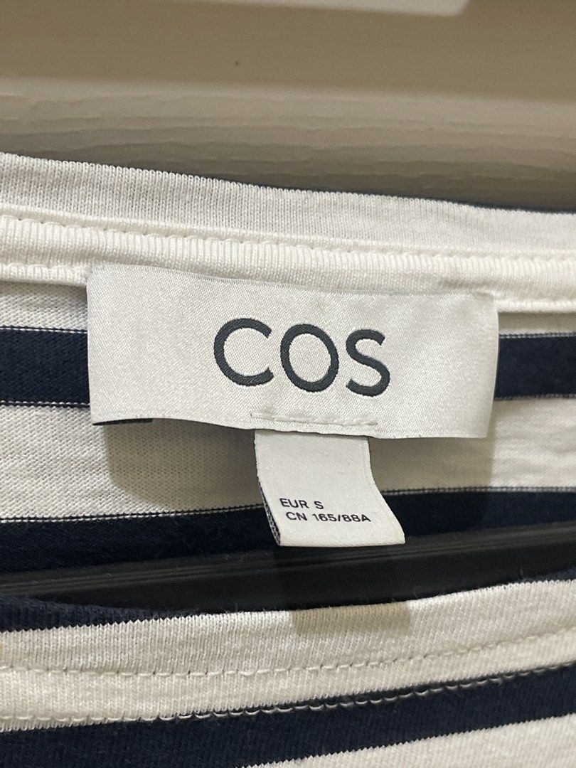 COS Striped Top - Size S (Category: Blouses) located in Makati City. Submitted by thingsoncelovedph (Listing ID 1438247105, Image 2). Description: - COS striped top WITH FLAW - Check last photo, small orange stain by the neck - Navy and white - Size S - Round neckline - Three-quarter sleeves - Comfortable fabric - Versatile for everyday wear.