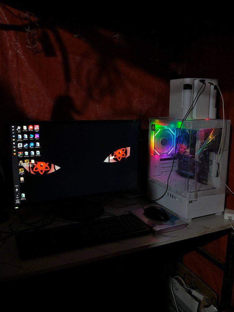 Custom PC with RGB Lighting (Category: Desktops) located in Manila. Submitted by jaguar0908 (Listing ID 1434560526, Image 1). Description: - Custom-built desktop PC with RGB lighting - Intel Core i5-3470 CPU - 16GB RAM - 578GB storage - Includes monitor, keyboard, and mouse - Clear side panel for viewing components - Ideal for gaming and general use .