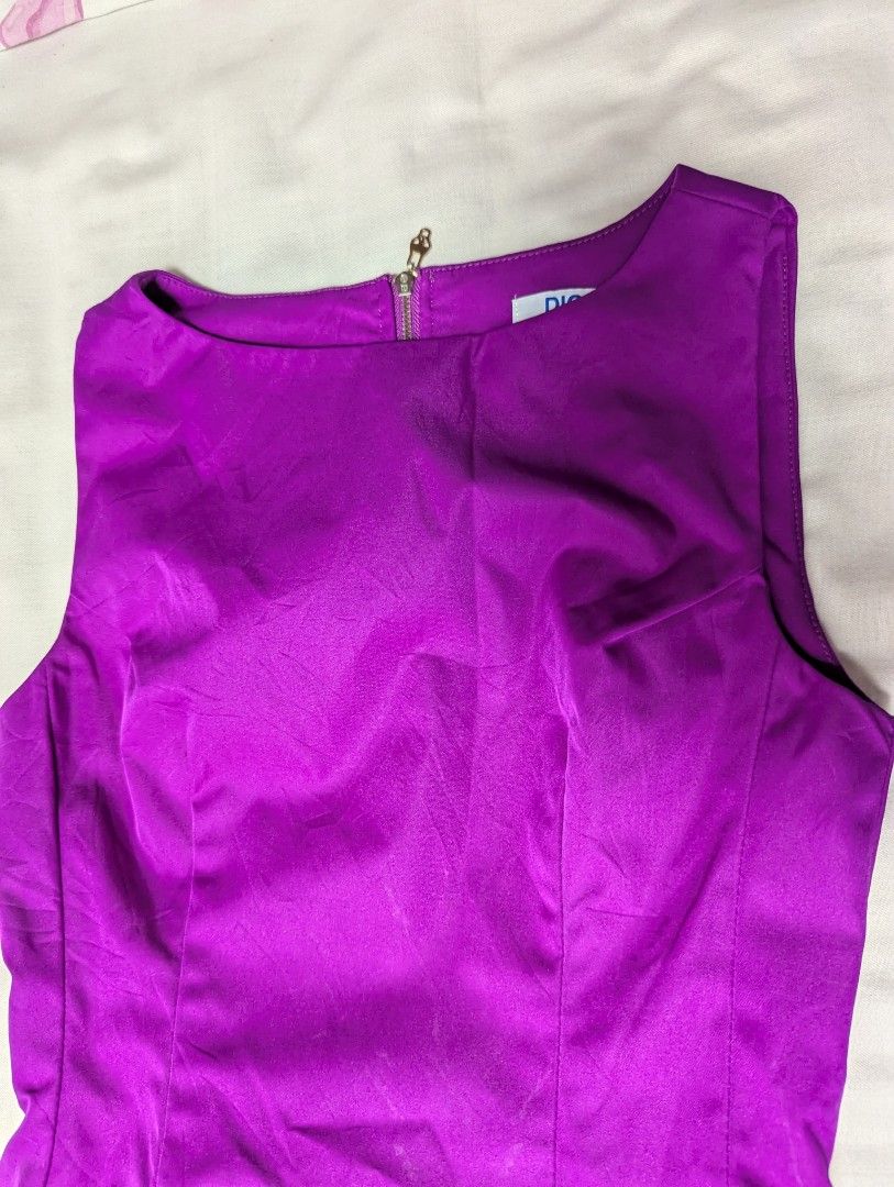 DIGM Purple Sleeveless Dress (Category: Dresses) located in Quezon City. Submitted by llue_ (Listing ID 1438190497, Image 3). Description: - Brand: DIGM - Color: Purple - Style: Sleeveless dress - Neckline: Round - Closure: Back zipper - Fit: Fitted bodice, flared skirt - Size: S - Occasion: Special events, night out Excellent condition. Worn once, very clean, and well-maintained. Send a DM if you want more photos or details. Ready to ship! ✨.