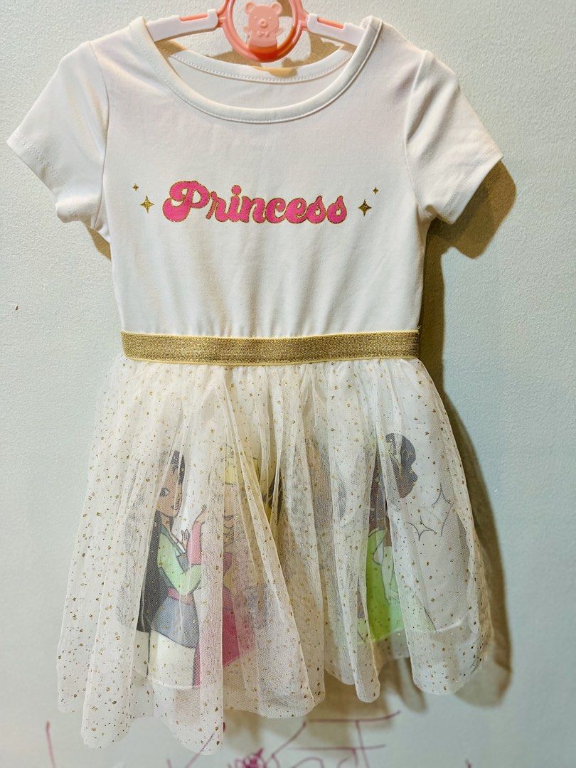Disney Princess Dress 2T (Category: Babies & Kids Fashion) located in Quezon City. Submitted by kjudz (Listing ID 1438156530, Image 1). Description: - Disney Princess dress, size 2T - White bodice with "Princess" in pink and gold - White tulle skirt with gold glitter and princess graphics - Gold waistband - Made of 90% polyester and 10% spandex - Used once.