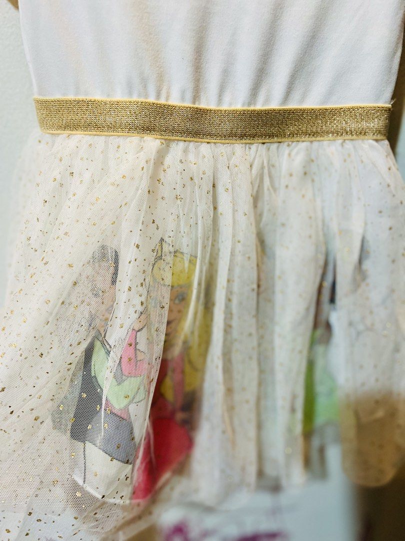 Disney Princess Dress 2T (Category: Babies & Kids Fashion) located in Quezon City. Submitted by kjudz (Listing ID 1438156530, Image 2). Description: - Disney Princess dress, size 2T - White bodice with "Princess" in pink and gold - White tulle skirt with gold glitter and princess graphics - Gold waistband - Made of 90% polyester and 10% spandex - Used once.