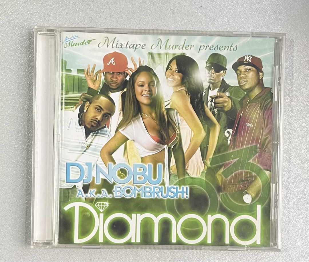 DJ Nobu A.K.A. Bombrush! Diamond 3 CD (Category: CDs & DVDs) located in Pasig City. Submitted by coolbreeze872 (Listing ID 1438212172, Image 1). Description: - "Diamond 3" CD by DJ Nobu A.K.A. Bombrush! - Features tracks from artists like Mario, Rihanna, Usher, Gwen Stefani, Amy Winehouse, Ne-yo, R Kelly, Akon - Comes in its original jewel case. - The disc is green with the title and artist's name. - Tracklist is printed on the back of the case..