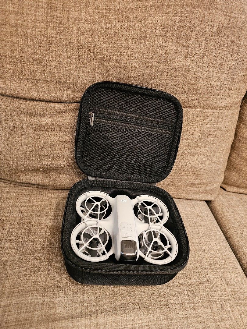 DJI NEO (Category: Drones) located in Las Pinas. Submitted by zealstone.eb5a04 (Listing ID 1438248759, Image 3). Description: - DJI Neo Drone - Includes two batteries - Charging hub with label - Black carrying case - Comes in original box - No issues.