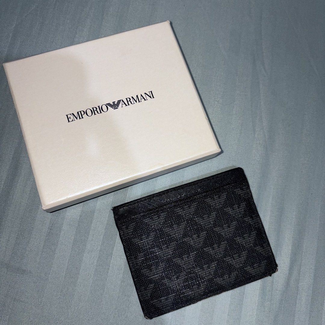 Emporio Armani Card Holder (Category: Luxury Bags & Wallets) located in Quezon City. Submitted by tigabo (Listing ID 1438286993, Image 3). Description: Authentic, Bought From Japan 6 Card Slots + Middle Pocket Used, Complete With Box and Tags Pickup at TGS Auto Shop.