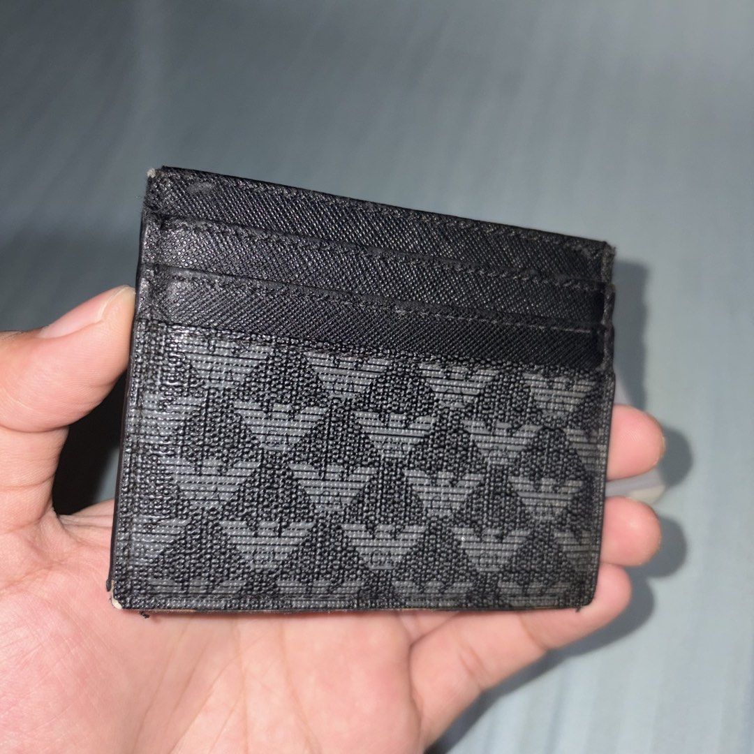 Emporio Armani Card Holder (Category: Luxury Bags & Wallets) located in Quezon City. Submitted by tigabo (Listing ID 1438286993, Image 2). Description: Authentic, Bought From Japan 6 Card Slots + Middle Pocket Used, Complete With Box and Tags Pickup at TGS Auto Shop.