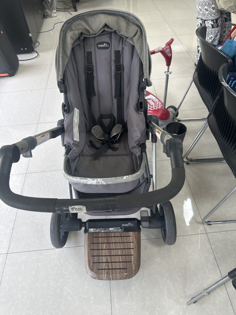 Evenflo Verano Stroller (Category: Strollers) located in Manila. Submitted by godinezcri59613 (Listing ID 1438120365, Image 3). Description: - Evenflo Verano stroller - Color: Gray - Features: - Canopy - Safety straps - Footrest - Cup holder - Sturdy frame - Comfortable seat - Suitable for everyday use - Intact wheels.