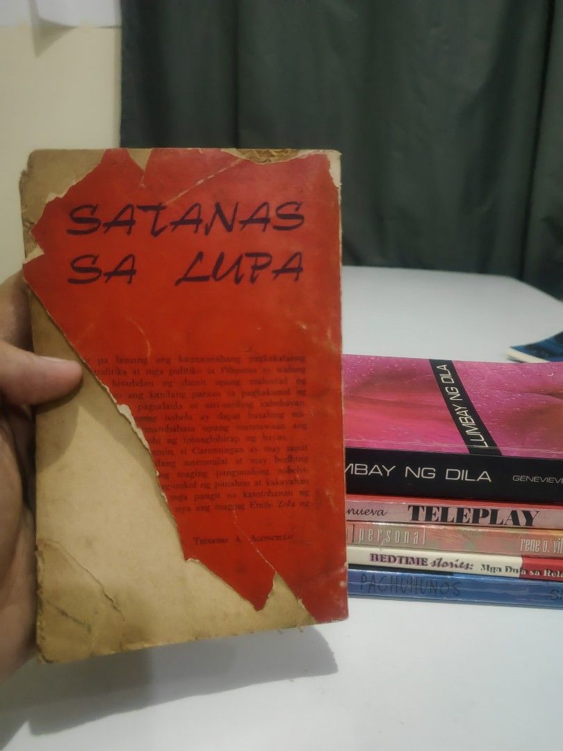 Filipino Books Bundle (Category: Storybooks) located in Naga. Submitted by bugoy_1988 (Listing ID 1438235045, Image 3). Description: - Bundle of Filipino books. - Includes "Satanas Sa Lupa" by Celso Al. Carunungan. - Features "Lumbay Ng Dila" by Genevieve L. Asenjo with Signature - Other titles included: "Teleplay," "Bedtime Stories," "Im Personal." - Books are in varying conditions..