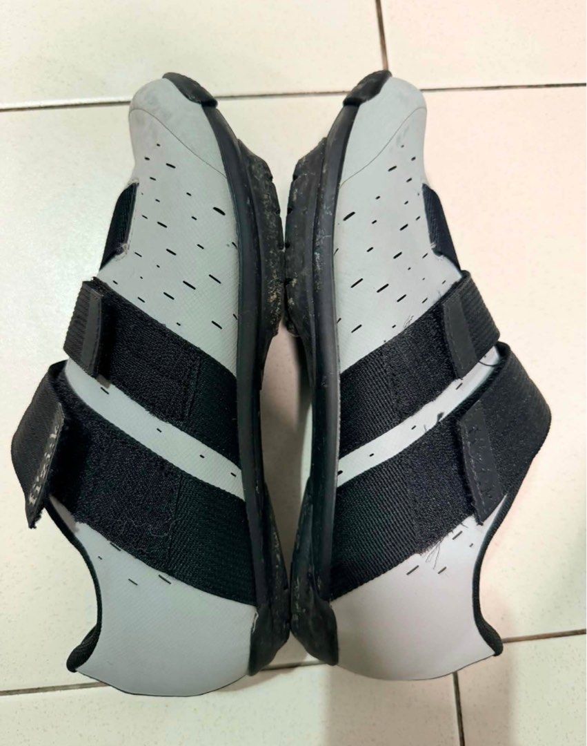 Fizik Terra Cycling Shoes (Category: Other Sports Equipment and Supplies) located in Binan City. Submitted by trendytots (Listing ID 1438165097, Image 3). Description: - Fizik Terra cycling shoes - Size 41 - Color: Grey and black - Features velcro straps - Perforated design for breathability - Cleats on soles for pedal attachment.