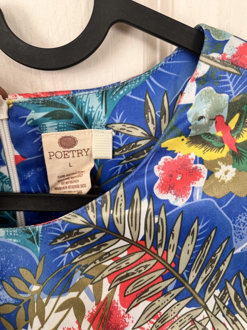 Floral Print Dress (Category: Dresses) located in Bacoor. Submitted by clothestodeclutter (Listing ID 1438144978, Image 2). Description: - Floral print in red, blue, and green - Long sleeves - Relaxed fit - Lightweight fabric - Round neckline - Simple and elegant design.