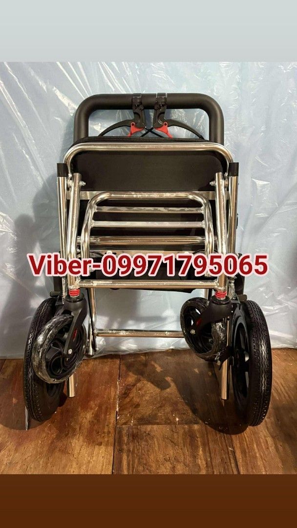 Folding Wheelchair light weight (Category: Wheelchairs) located in Manila. Submitted by jecelj_295c8a (Listing ID 1438187071, Image 3). Description: - Folding wheelchair - Red and black seat and backrest - Features armrests - Sturdy frame - Lightweight and easy to carry.
