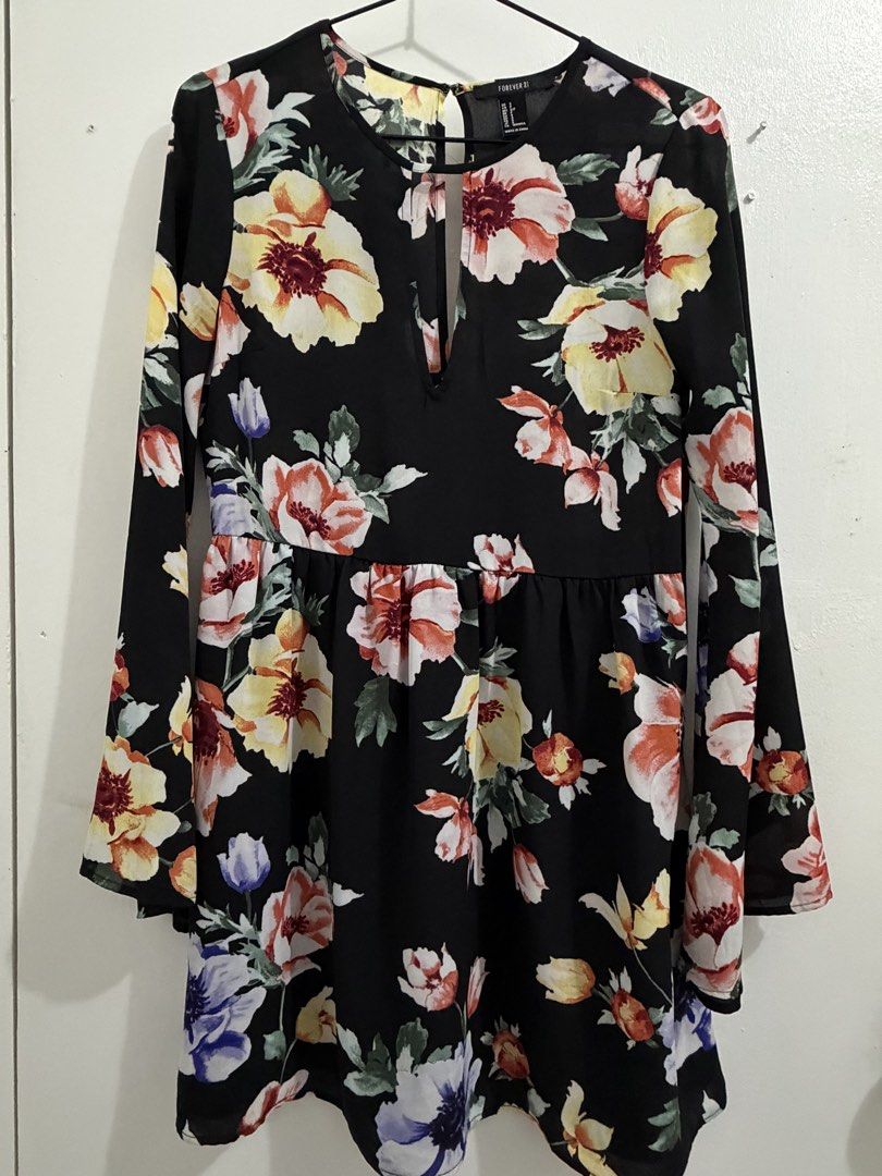 Forever 21- Floral dress (Category: Dresses) located in Angeles City. Submitted by seraphine103 (Listing ID 1438245353, Image 1). Description: Used once .