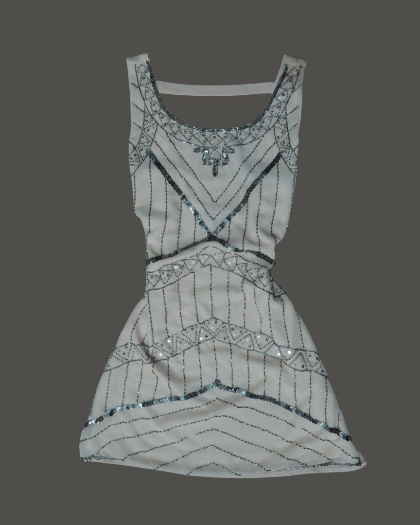 FOREVER 21 Sequined / Bedazzled / Beaded Mini Dress (Category: Dresses) located in Naga. Submitted by ars.amandi (Listing ID 1438212323, Image 1). Description: Item photo on the 1st slide is scrunched, actual laid flat photo is in the 2nd slide. Offer your prices, I badly need to declutter my closet. I can consider your offers for this one. Has some fallen beads but not much, dm for item condition. I bought this so I can alter it but I hadn’t had