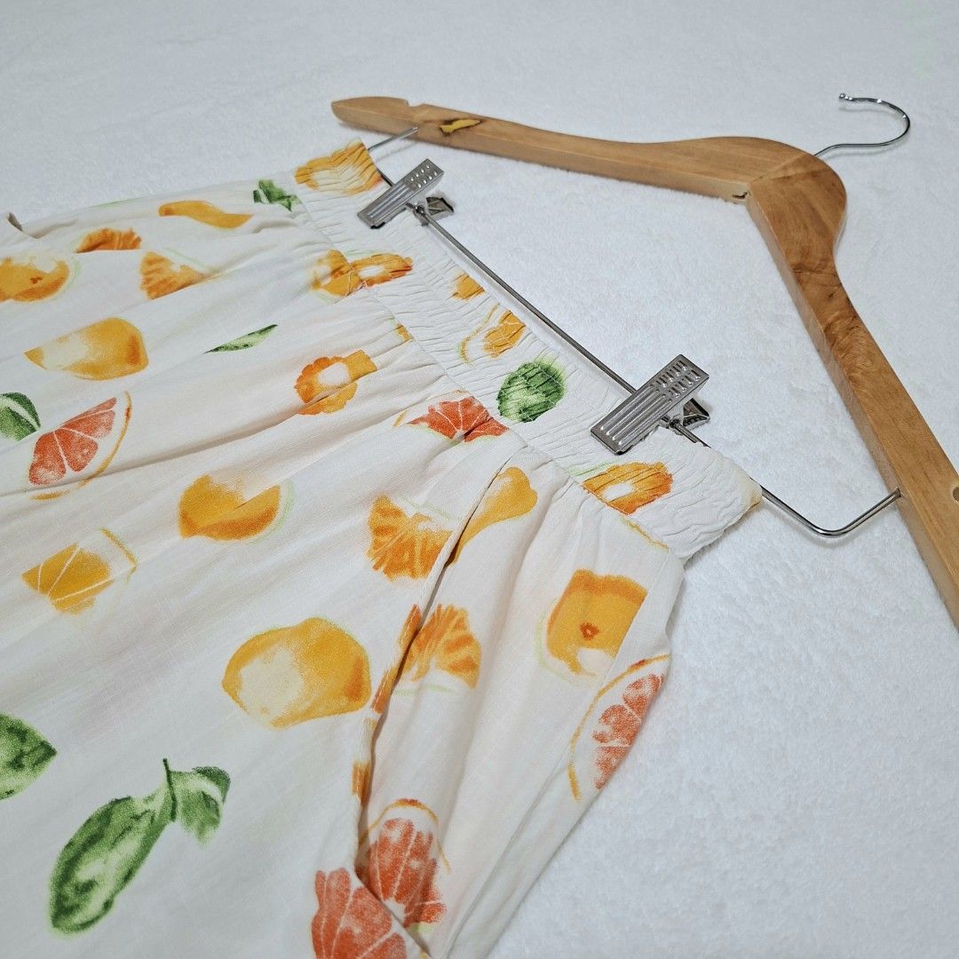 Free shipping!Fruit Print Skirt (Category: Skirts) located in Batangas. Submitted by sell_ph (Listing ID 1438257764, Image 3). Description: - Maxi skirt with vibrant fruit print - Comfortable elastic waistband - Lined with a lighter fabric - Features orange, grapefruit, and green leaf patterns - Flowy and lightweight design - Ideal for warm weather.