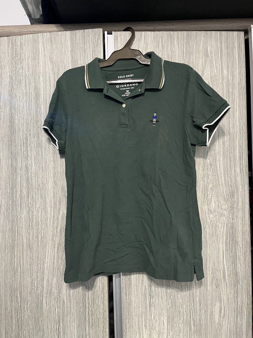 Giordano Polo Shirt (Category: Shirts) located in Mandaluyong City. Submitted by _cfpl (Listing ID 1438220353, Image 1). Description: - Giordano polo shirt - Green color - Size: M - Classic design - Collared neckline with two-button placket - Short sleeves with white trim - Embroidered logo on chest - Perfect for casual wear.