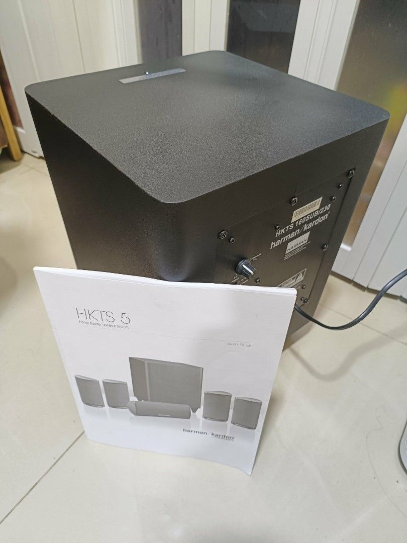 Harman Kardon HKTS 5 Subwoofer (Category: Soundbars, Speakers & Amplifiers) located in Angono. Submitted by annie07noel (Listing ID 1438272604, Image 1). Description: - Harman Kardon HKTS 5 subwoofer - Black color - Includes original manual - Model number clearly visible.
