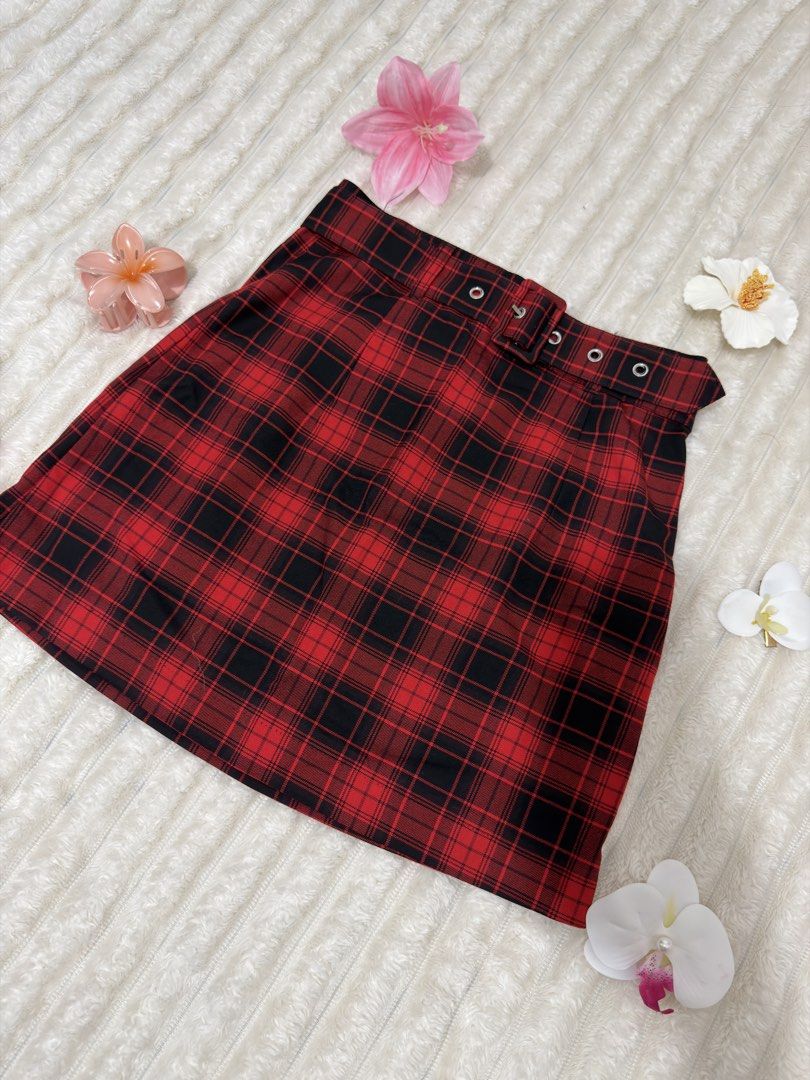 H&M Red Plaid Skirt (Category: Skirts) located in Pasig City. Submitted by jamie.sebuc (Listing ID 1438150114, Image 2). Description: - H&M plaid skirt (red & black) - Features a belt with eyelet details - Classic plaid pattern - Flattering A-line shape - Original price: ₱899 - Perfect for a chic outfit.