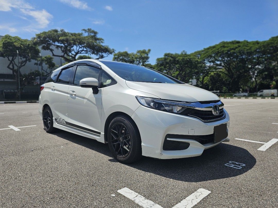 Honda Shuttle 1.5 G Honda Sensing (A) (Category: Used Cars) located in Singapore. Submitted by _psp7_ (Listing ID 1438117111, Image 1). Description: Letting go this reliable, powerful (130hp, highest in Cat A) and spacious family car, which serve us well. This work horse comes with black sports rims, nice brown leather seats, Pioneer headunit that supports wireless carplay and android auto, heads-up display unit, Kamatto rubber mat, rear boot rub