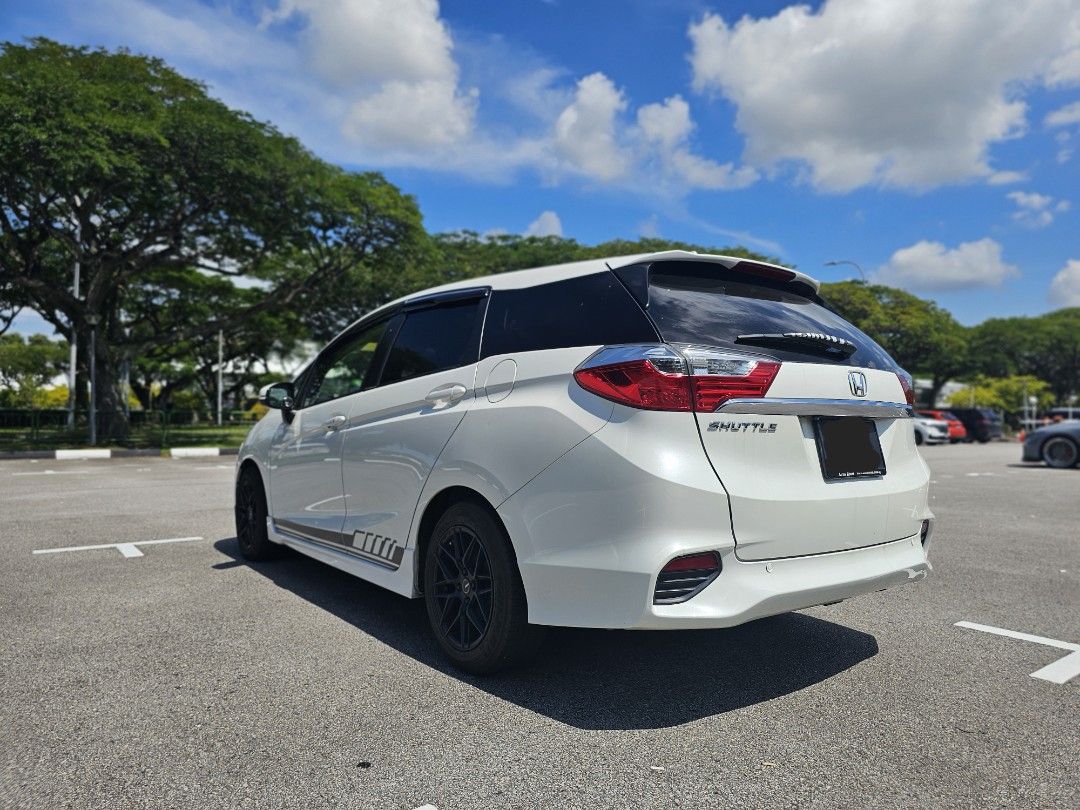Honda Shuttle 1.5 G Honda Sensing (A) (Category: Used Cars) located in Singapore. Submitted by _psp7_ (Listing ID 1438117111, Image 2). Description: Letting go this reliable, powerful (130hp, highest in Cat A) and spacious family car, which serve us well. This work horse comes with black sports rims, nice brown leather seats, Pioneer headunit that supports wireless carplay and android auto, heads-up display unit, Kamatto rubber mat, rear boot rub