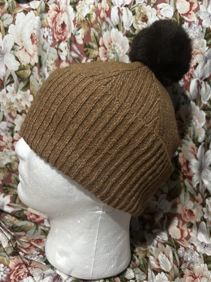 Jason Wu Brown Beanie with Pom (Category: Hats & Beanies) located in Imus. Submitted by swiftfire_39c538 (Listing ID 1438303044, Image 1). Description: - Jason Wu brown beanie - Ribbed knit design - Dark brown pom on top - One Size - Soft and comfortable material - Unisex.