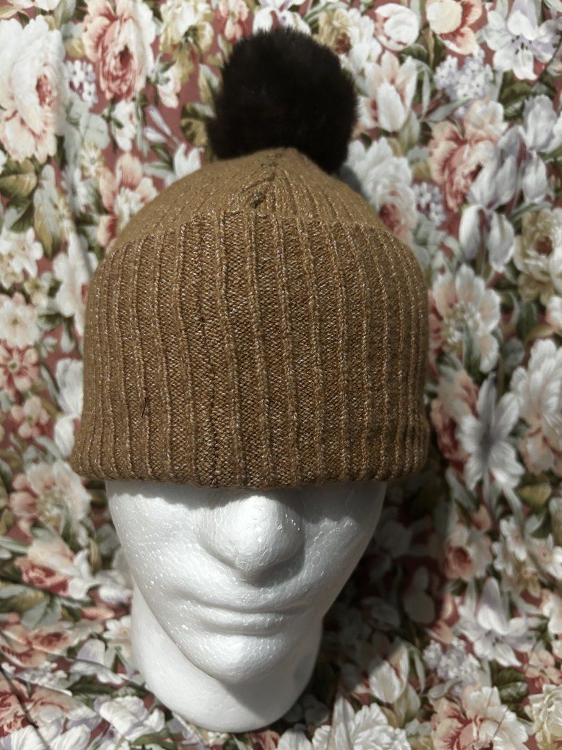Jason Wu Brown Beanie with Pom (Category: Hats & Beanies) located in Imus. Submitted by swiftfire_39c538 (Listing ID 1438303044, Image 2). Description: - Jason Wu brown beanie - Ribbed knit design - Dark brown pom on top - One Size - Soft and comfortable material - Unisex.