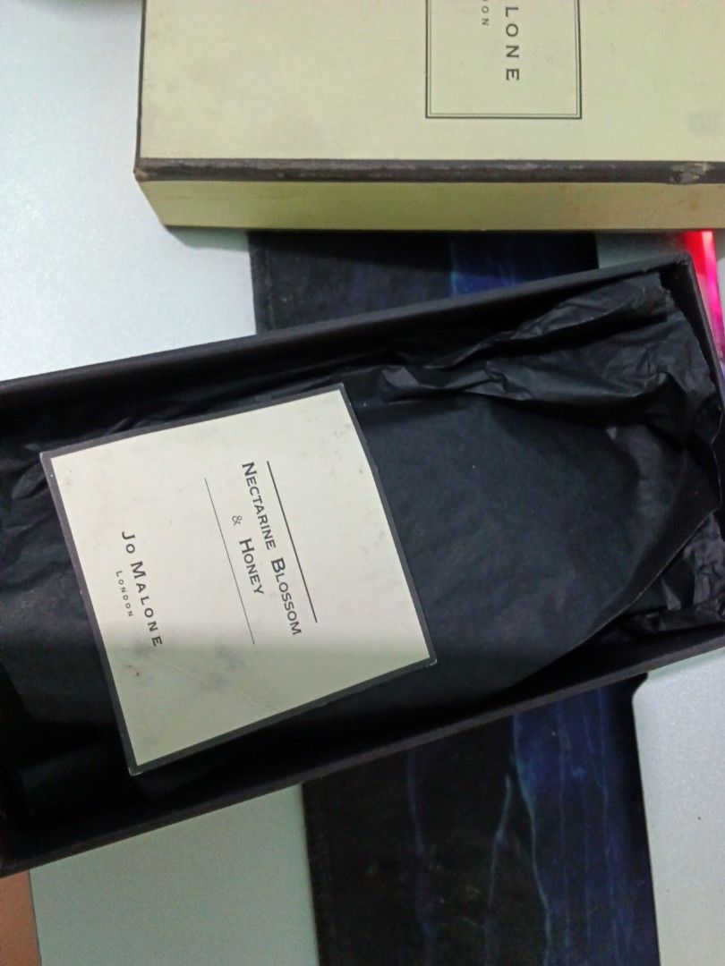 Jo Malone nectarine blossom and honey (Category: Fragrance & Deodorants) located in Pasig City. Submitted by perfumesrus (Listing ID 1438220233, Image 3). Description: Original Jo Malone bought from Japan way back 2019 pa ata to Basta this was bought before pandemic pa when we we're reselling Jo Malone perfumes. This was a Jo Malone stock and hind na nabenta. Please check the box for the condition, the box is not so nice na since stock na siya fo