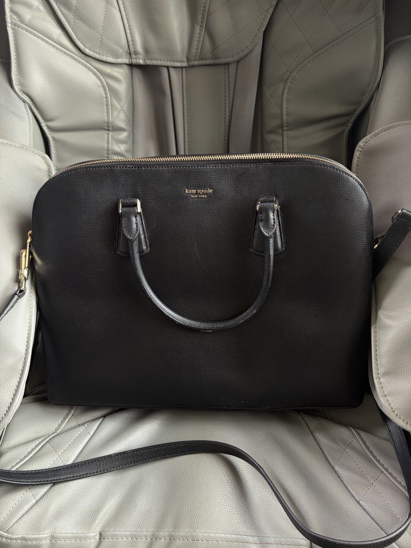 Kate Spade Black Laptop Bag (Category: Luxury Bags & Wallets) located in Manila. Submitted by akingkingking (Listing ID 1438187404, Image 1). Description: - Black Kate Spade laptop bag - Top handle and detachable shoulder strap - Gold-tone zipper and hardware - Pink fabric lining - Multiple interior compartments, can fit up to 15” laptop - with dust bag .