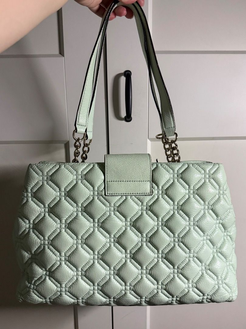 Authentic Kate Spade Shoulder Bag (Category: Luxury Bags & Wallets) located in Quezon City. Submitted by mnhipolito (Listing ID 1438284938, Image 2). Description: Brand New and Authentic Kate Spade Elena Astor Court Bag - Never used and comes with a Kate Spade Dust Bag - Color: Mint - Quilted design - Flap closure with metallic logo - Chain straps - Rectangular shape - Leather material RFS: This bag was only given but is not my type Price is slig