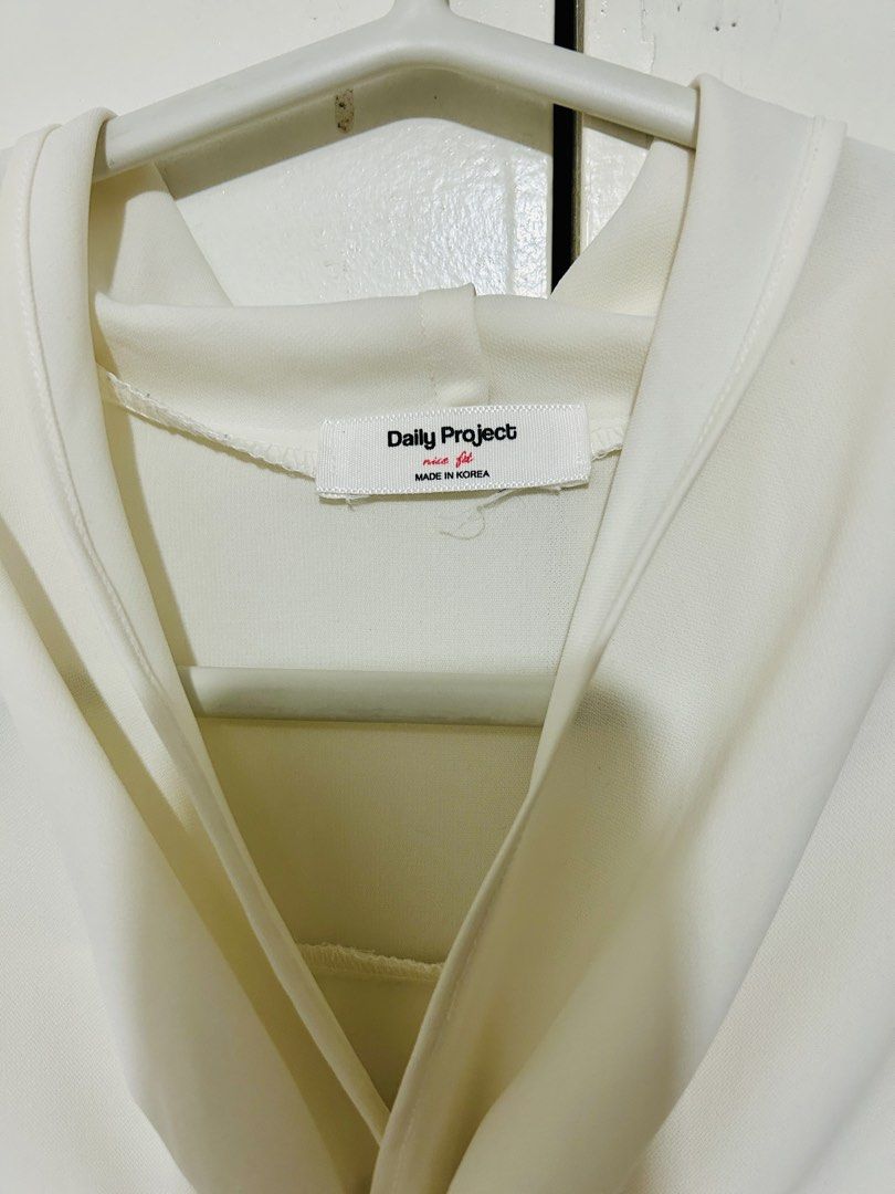 Korean Cream Long sleeves Blouse (Category: Blouses) located in Quezon City. Submitted by closetgoodeez (Listing ID 1438240087, Image 3). Description: *FOR SALE PRELOVED BLOUSE * - long sleeves cream blouse - Tie-neck design - Long sleeves - Button-down front - Relaxed fit - Made in Korea - Lightweight fabric - Classic and versatile style - LENGTH: approx. 24 inches - sleeve length: 21 inches * No reservations/holds * Payment required to secure i