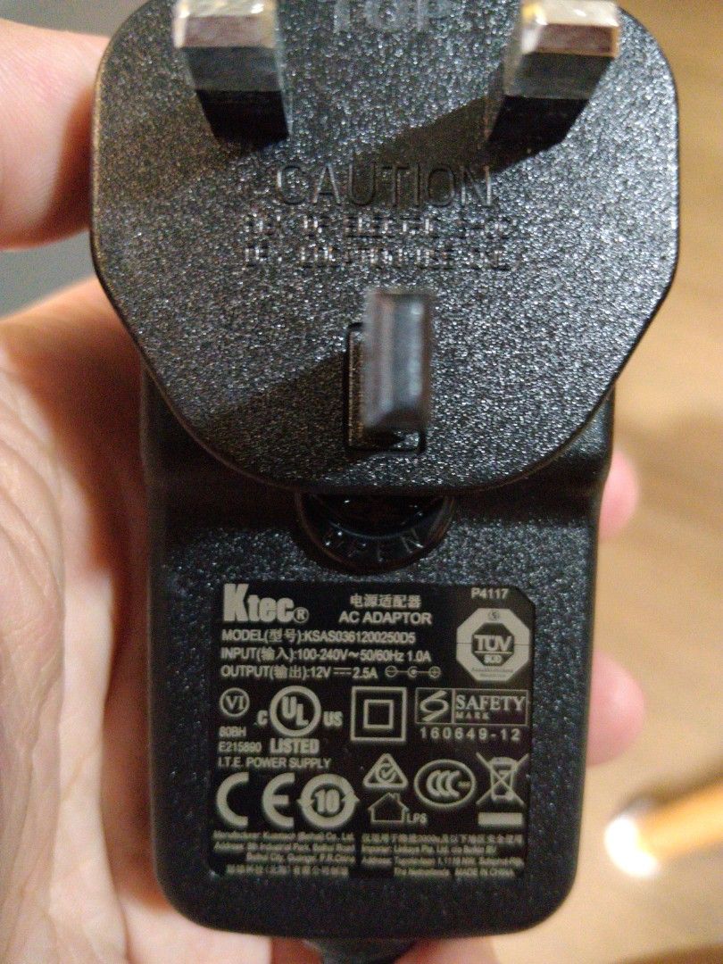 Ktec AC Adapter - Model KSA036120025005 (Category: Cables & Adaptors) located in Singapore. Submitted by gogoduckling (Listing ID 1438140990, Image 1). Description: - Ktec AC adapter - Model: KSA036120025005 - Input: 100-240V ~ 50/60Hz 1.0A - Output: 12V 2.5A - Includes adapter and power cable - Tested and working.