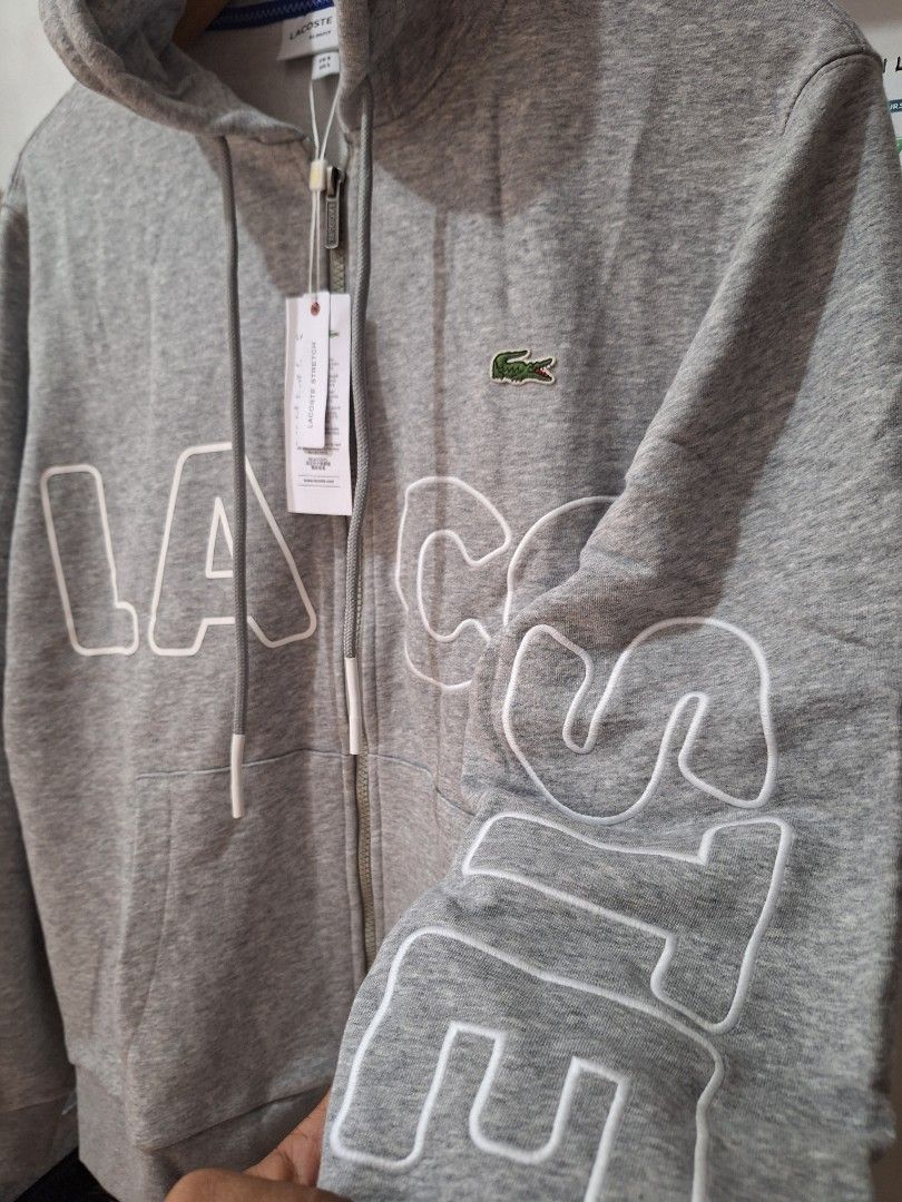 Lacoste hoodie gray zip up (Category: Coats, Jackets and Outerwear) located in Muntinlupa City. Submitted by kstefanomela14 (Listing ID 1438167375, Image 3). Description: brandnew Legit Lacoste zip pullover hoodie small - 20 x 26 Large - 21.5 x 27.5 Xxl - 23.5 x 29 Cod Cop Lbc lalamove j&t.