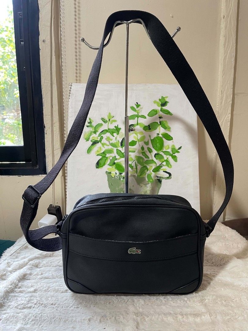 Lacoste Sling bag for men Original (Category: Sling Bags) located in Naawan. Submitted by twillycalledprelovedbags (Listing ID 1438159611, Image 1). Description: issue: nag bakbak Ang kanyang creed sa loob, and may konting dirt sa loob.