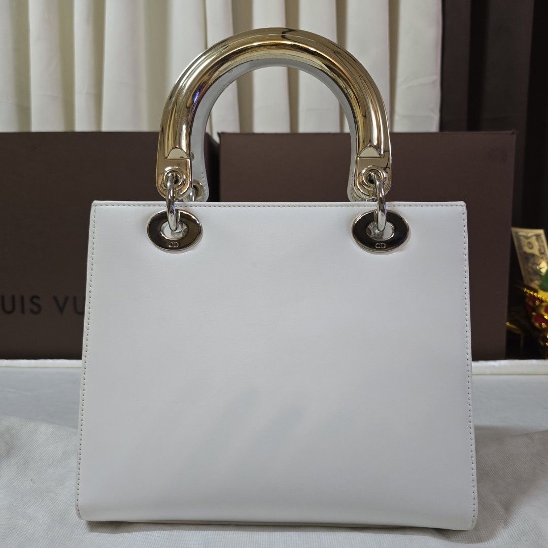 Lady Dior Med.🤍🤍limtd.edt (Category: Luxury Bags & Wallets) located in Paranaque City. Submitted by kyshei (Listing ID 1438216614, Image 2). Description: 💯legit /orig with dustbag authen.cards ❌️no strap‼️‼️‼️ last price posted.