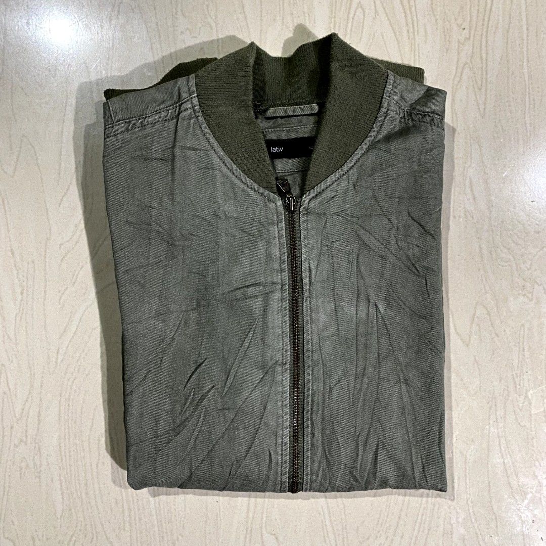Lativ by UNIQLO Olive Bomber Jacket (Category: Coats, Jackets and Outerwear) located in Quezon City. Submitted by thequalityflips (Listing ID 1438119776, Image 2). Description: Lativ by UNIQLO Olive Bomber Jacket Size: M on tag Dimes: W-20.5 “ L-24 (20.5x24) Fits to Medium & Semi Large Unisex (for men & women) Brandnew Condition Excellent Condition No Issue.