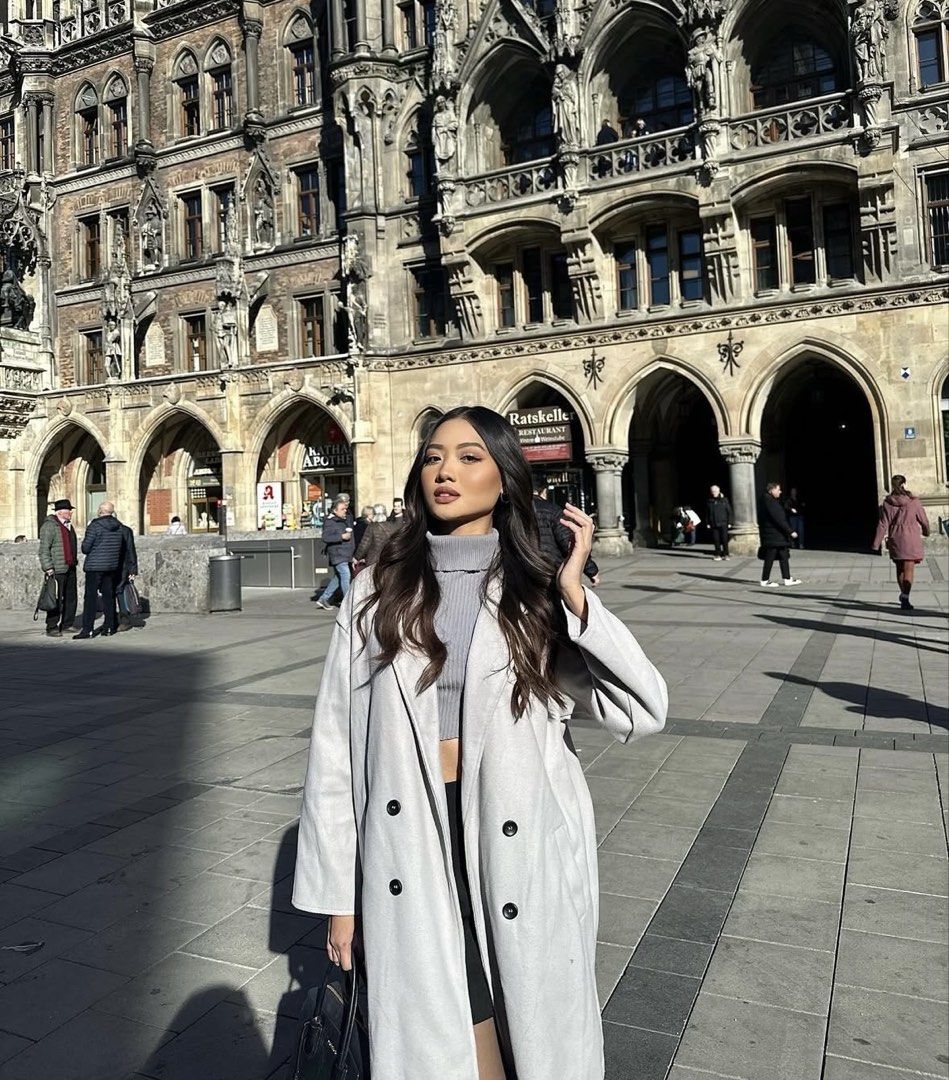 Light Gray Long Coat (Category: Coats, Jackets and Outerwear) located in Dasmarinas. Submitted by shopvtc (Listing ID 1438166360, Image 1). Description: - Light gray long coat - Double-breasted design - Classic lapel collar - Mid-length cut - Suitable for layering - Relaxed fit - Ideal for cooler weather - Smooth, possibly wool-blend fabric.