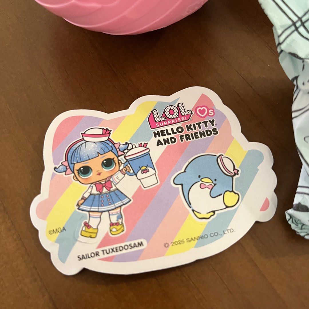 LOL Surprise Hello Kitty and Friends (Category: Kids Toys) located in Marikina City. Submitted by bianchii13 (Listing ID 1438183973, Image 3). Description: - LOL Surprise ball with Kitty and Friends! - Includes a doll and accessories. - Packaging features Sailor Tuxedosam. - White ball with red bow and pink accents. - Comes with unopened surprise elements..