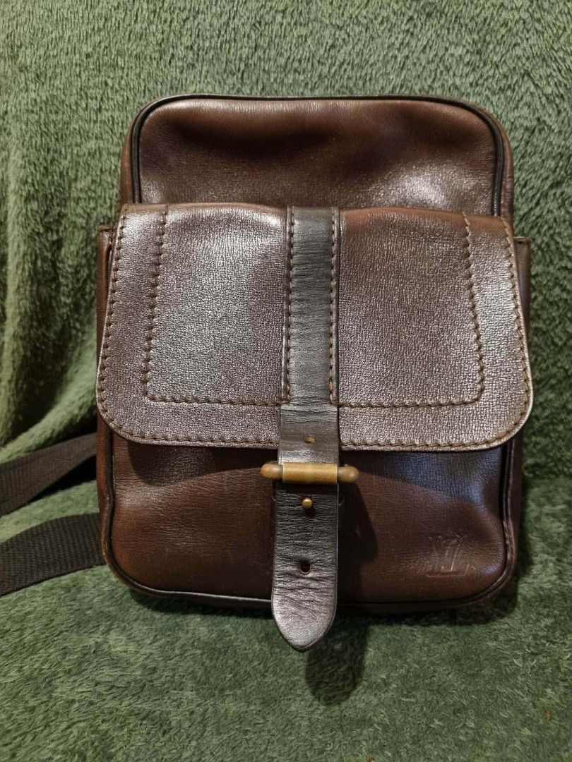 Louis Vuitton Brown Leather Shoulder Bag (Category: Luxury Bags & Wallets) located in Quezon City. Submitted by edwinvuru (Listing ID 1438153865, Image 1). Description: - Authentic Louis Vuitton shoulder bag - Brown leather - Flap closure with buckle - Zip closure - Interior brand label - Shoulder strap - Louis Vuitton logo on zippers - Made in France.