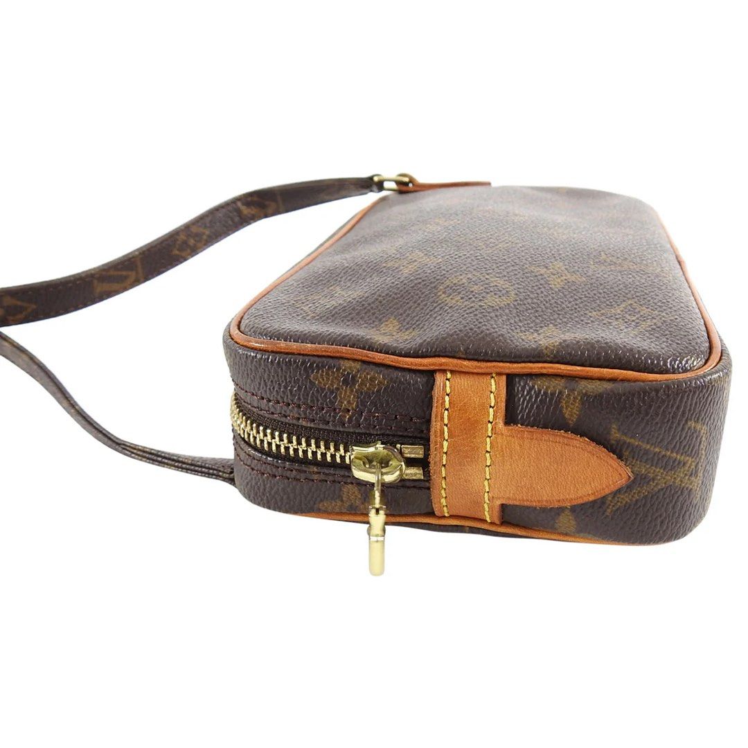 Louis Vuitton Monogram Marly Bandouliere Brown (Category: Luxury Bags & Wallets) located in Manila. Submitted by jeonsbit (Listing ID 1438243064, Image 2). Description: - Authentic Louis Vuitton Vintage 2000s Monogram Marly Bandouliere Brown - Classic Monogram pattern - Brown leather strap - Gold-tone hardware - Rectangular shape -Newly serviced/cleaned -Authenticity can be proved with papers. .