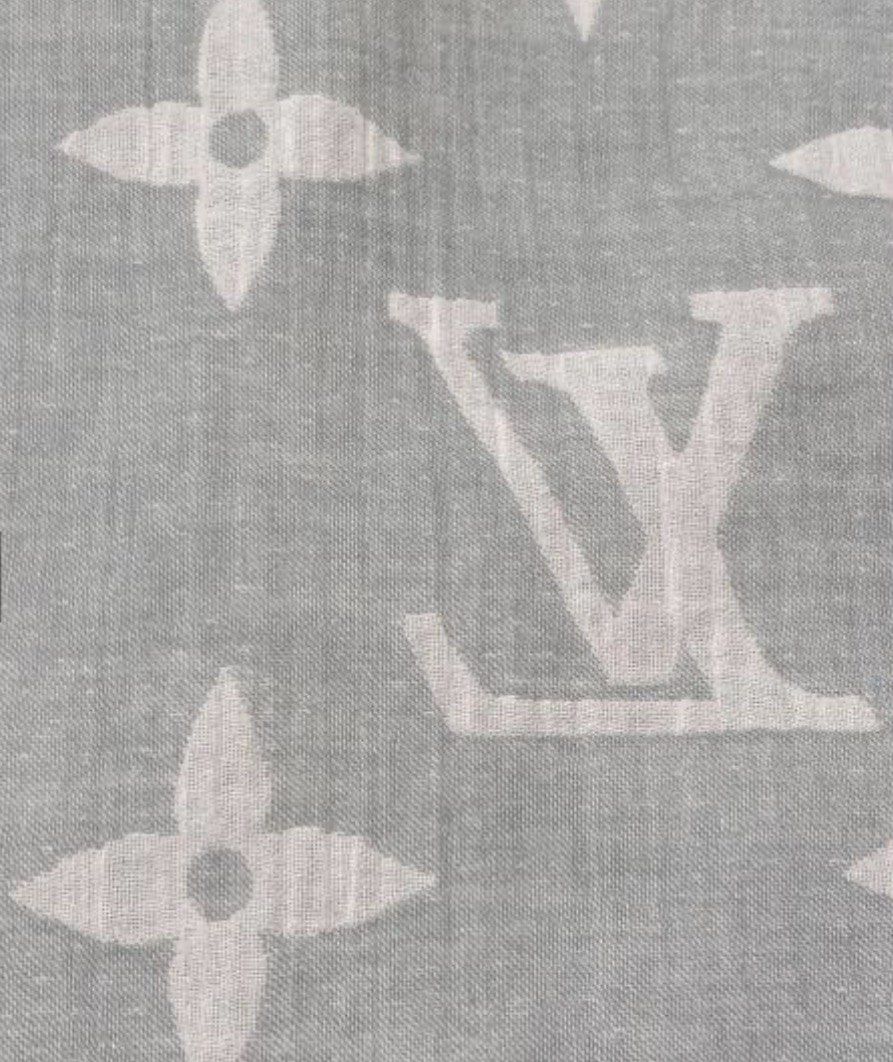 Louis Vuitton Monogram Shawl Limited Style (Category: Luxury Accessories) located in Quezon City. Submitted by marymae1223 (Listing ID 1425633017, Image 2). Description: Shawl features the iconic Louis Vuitton monogram pattern. It has a light blue base color with the monogram in a slightly darker shade. The edges are trimmed with a contrasting color and fringe. Limited collection only sold at some bigger LV stores guaranteed authentic gcash payme
