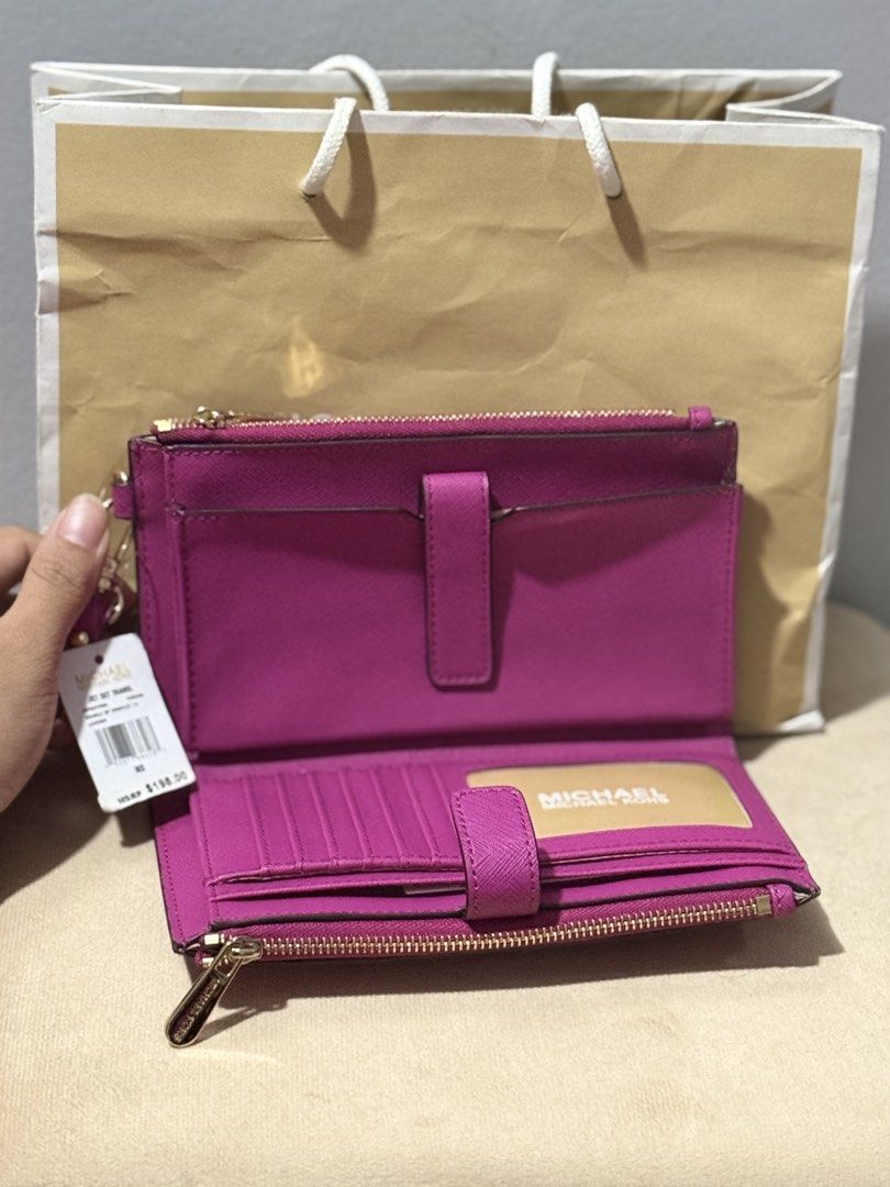 Michael Kors Jet Set Travel Double Zip (Category: Wallets & Card holders) located in Mandaluyong City. Submitted by annie_cun (Listing ID 1438226089, Image 2). Description: For sale Michael Kors Jet SetTravel Color: Fuschia From US. Priced @ 198USD Selling for 5500 PHP Meetup metro Manila Pm me.