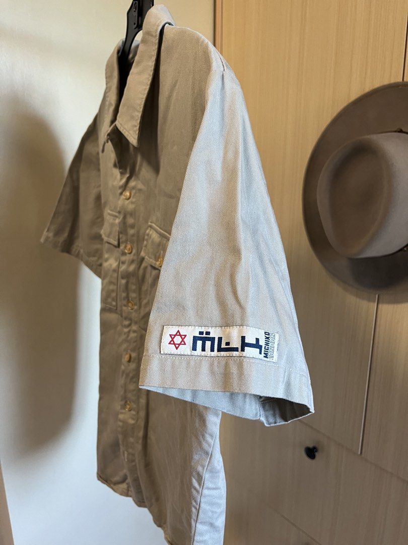 MICHIKO KOSHINO Utility Short Sleeve Button down Polo size Medium (Category: Tshirts & Polo Shirts ) located in Makati City. Submitted by ped.yanza (Listing ID 1438198722, Image 2). Description: MICHIKO KOSHINO London beige cotton short-sleeve button-down shirt with dual front chest pockets Boxy fit. Size Medium Measurements in inches (Laid flat) Length 25.5 Width pit to pit 21 Shoulder 18 Excellent condition Location: Pasay (Near DLSU or Gil Puy