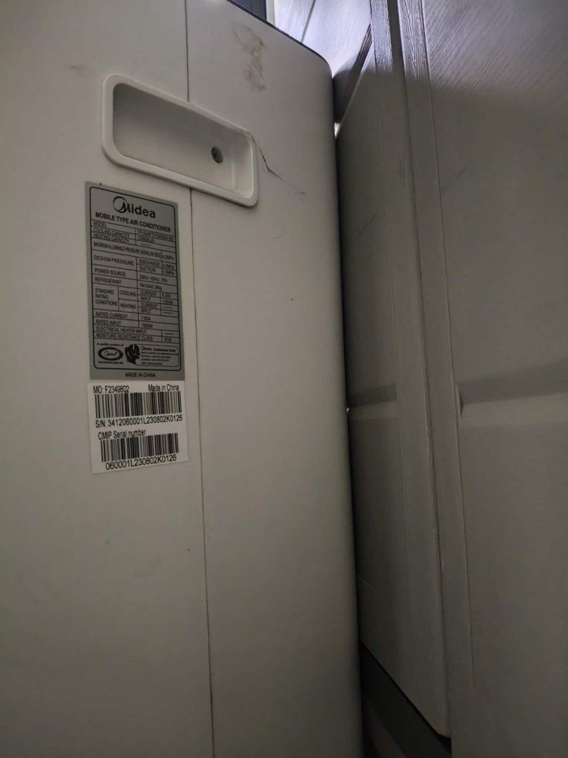 Midea Portable Air Conditioner - 1.5 hp (Category: Air Conditioning and Heating) located in Marikina City. Submitted by wellawels.cruz (Listing ID 1438121315, Image 2). Description: - Midea portable air conditioner 1.5 hp - White exterior - Portable with a built-in handle - Model number: "F2345802" - Designed for easy room cooling - Rarely used (installed in our living room) - No issues and no history of repair - RFS: Need to replace with split t