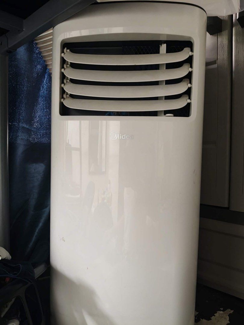 Midea Portable Air Conditioner - 1.5 hp (Category: Air Conditioning and Heating) located in Marikina City. Submitted by wellawels.cruz (Listing ID 1438121315, Image 1). Description: - Midea portable air conditioner 1.5 hp - White exterior - Portable with a built-in handle - Model number: "F2345802" - Designed for easy room cooling - Rarely used (installed in our living room) - No issues and no history of repair - RFS: Need to replace with split t