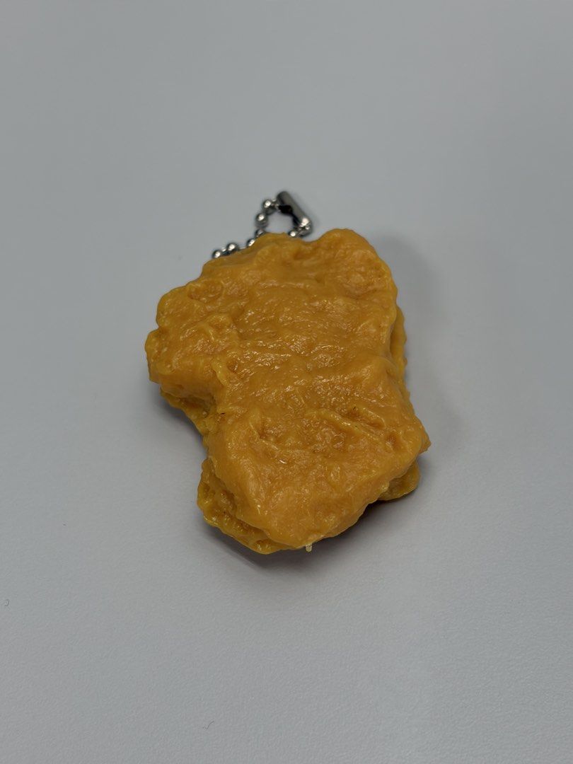 Miniature Chicken Nugget Keychain from Japan (Category: Character Goods) located in Makati City. Submitted by ia.collectibles (Listing ID 1438158307, Image 3). Description: .