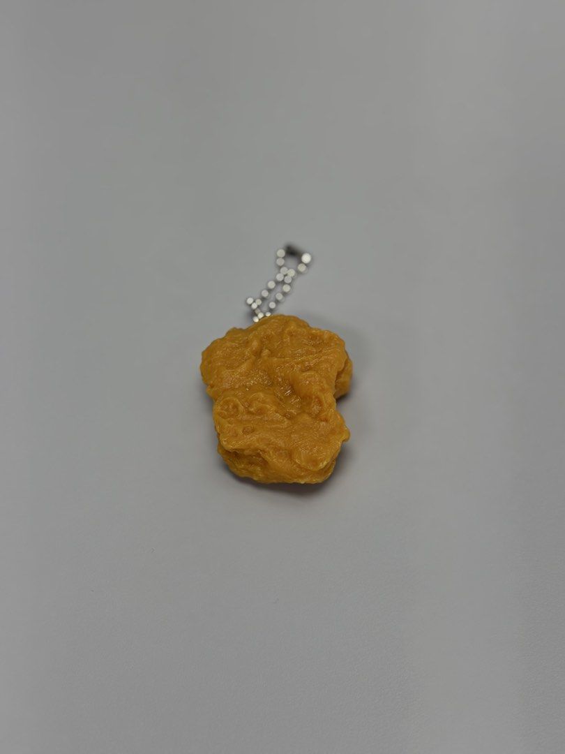 Miniature Chicken Nugget Keychain from Japan (Category: Character Goods) located in Makati City. Submitted by ia.collectibles (Listing ID 1438158307, Image 1). Description: .