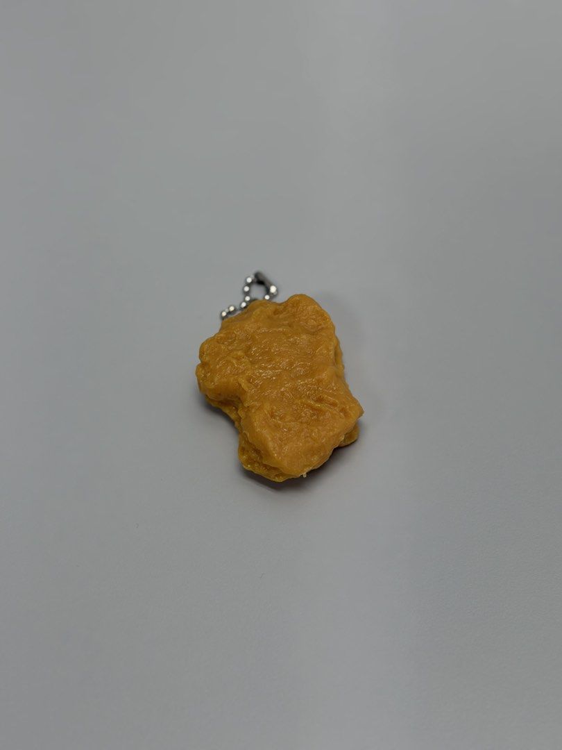 Miniature Chicken Nugget Keychain from Japan (Category: Character Goods) located in Makati City. Submitted by ia.collectibles (Listing ID 1438158307, Image 2). Description: .