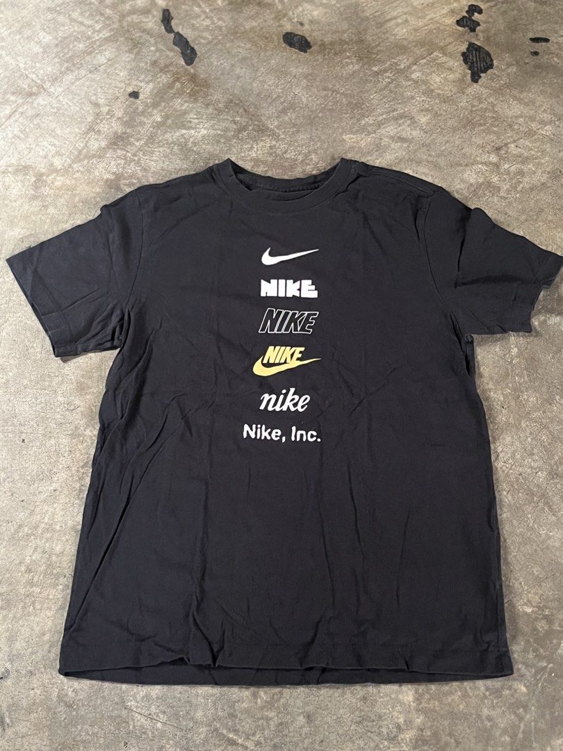 Nike The Nike Tee Black Shirt (Category: Tshirts & Polo Shirts ) located in Manila. Submitted by andreiming84756 (Listing ID 1438174078, Image 1). Description: - Black Nike T-shirt - Features multiple Nike logos on the front - Crew neck style - Size: M - 'The Nike Tee' - Made in China.