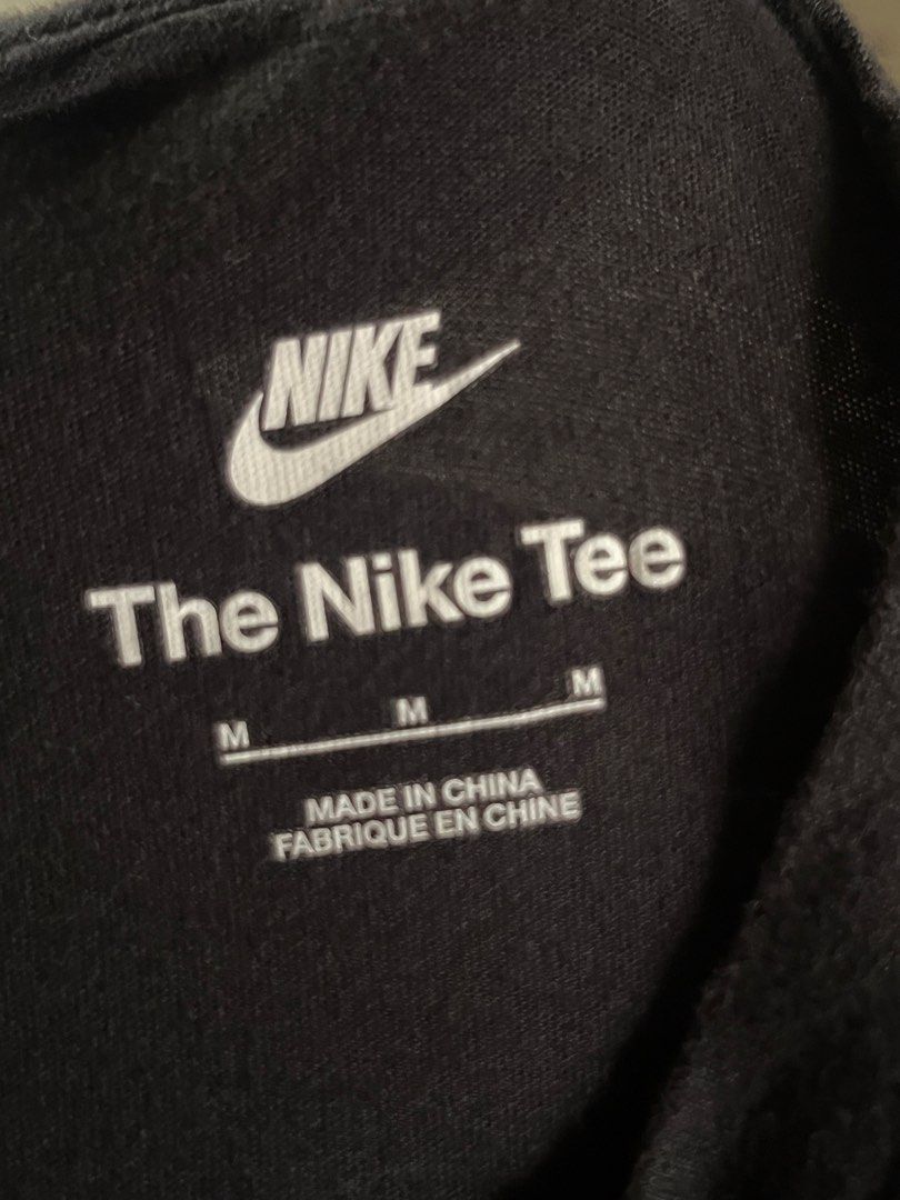 Nike The Nike Tee Black Shirt (Category: Tshirts & Polo Shirts ) located in Manila. Submitted by andreiming84756 (Listing ID 1438174078, Image 2). Description: - Black Nike T-shirt - Features multiple Nike logos on the front - Crew neck style - Size: M - 'The Nike Tee' - Made in China.
