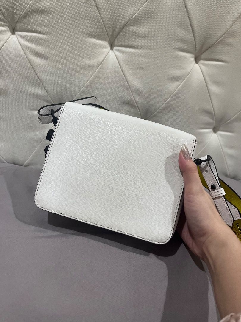 Orig Off-White diagonal Binder clip Bag (Category: Luxury Bags & Wallets) located in Quezon City. Submitted by docagillemontemayor (Listing ID 1438224056, Image 3). Description: Condition 8/10 Complete 3 Slings included and tags Issue: Lost Binder Clip Front bag and minimal stain as seen on picture MONEY BACK IF PROVEN FAKE!💯 Can do meet ups so u can check the bag itself, just message me. DISCLAIMER: We are not associated or affiliated with any 